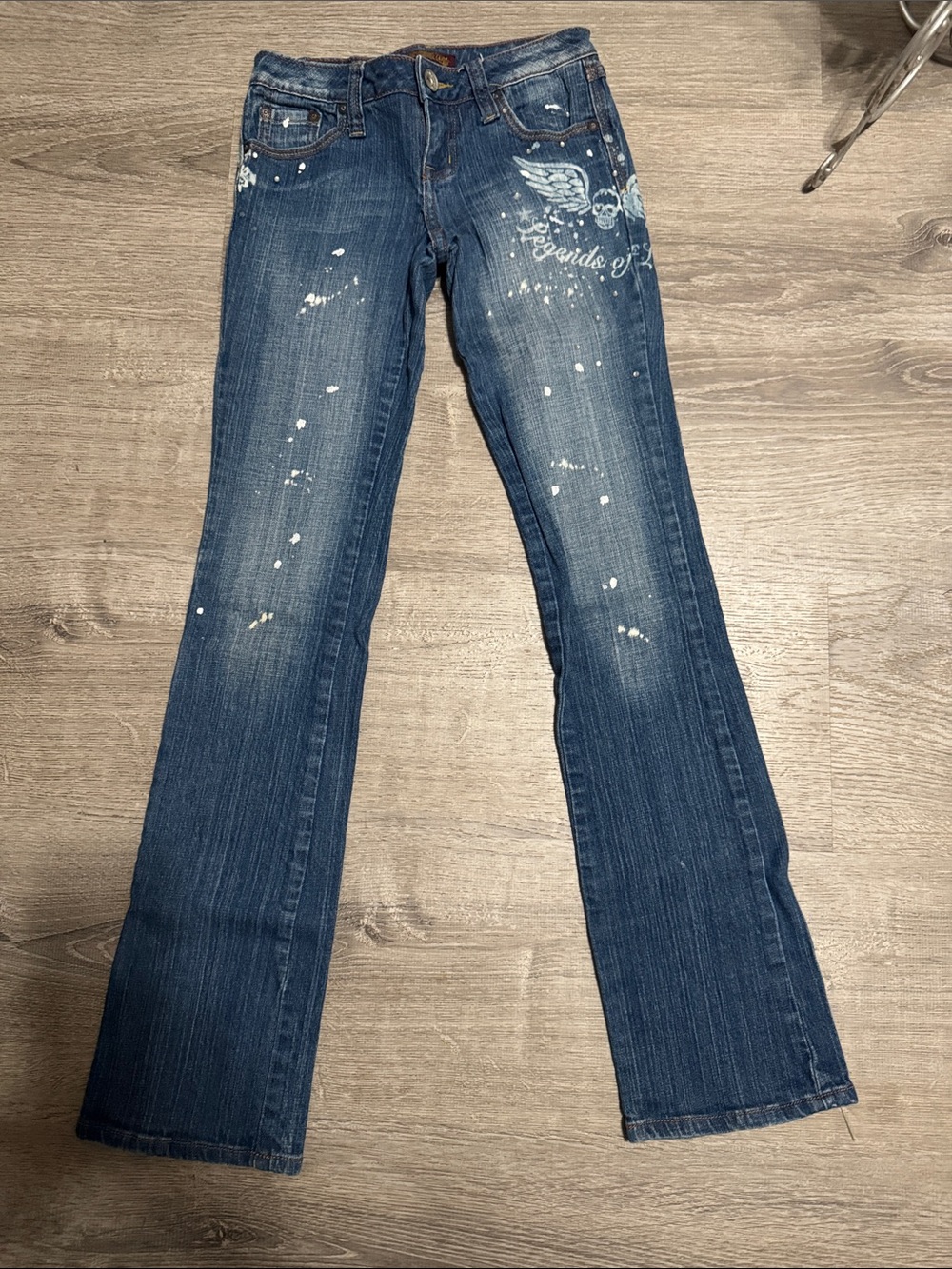 Women’s Dark Blue Distressed Bootcut Jeans with Wing Detail